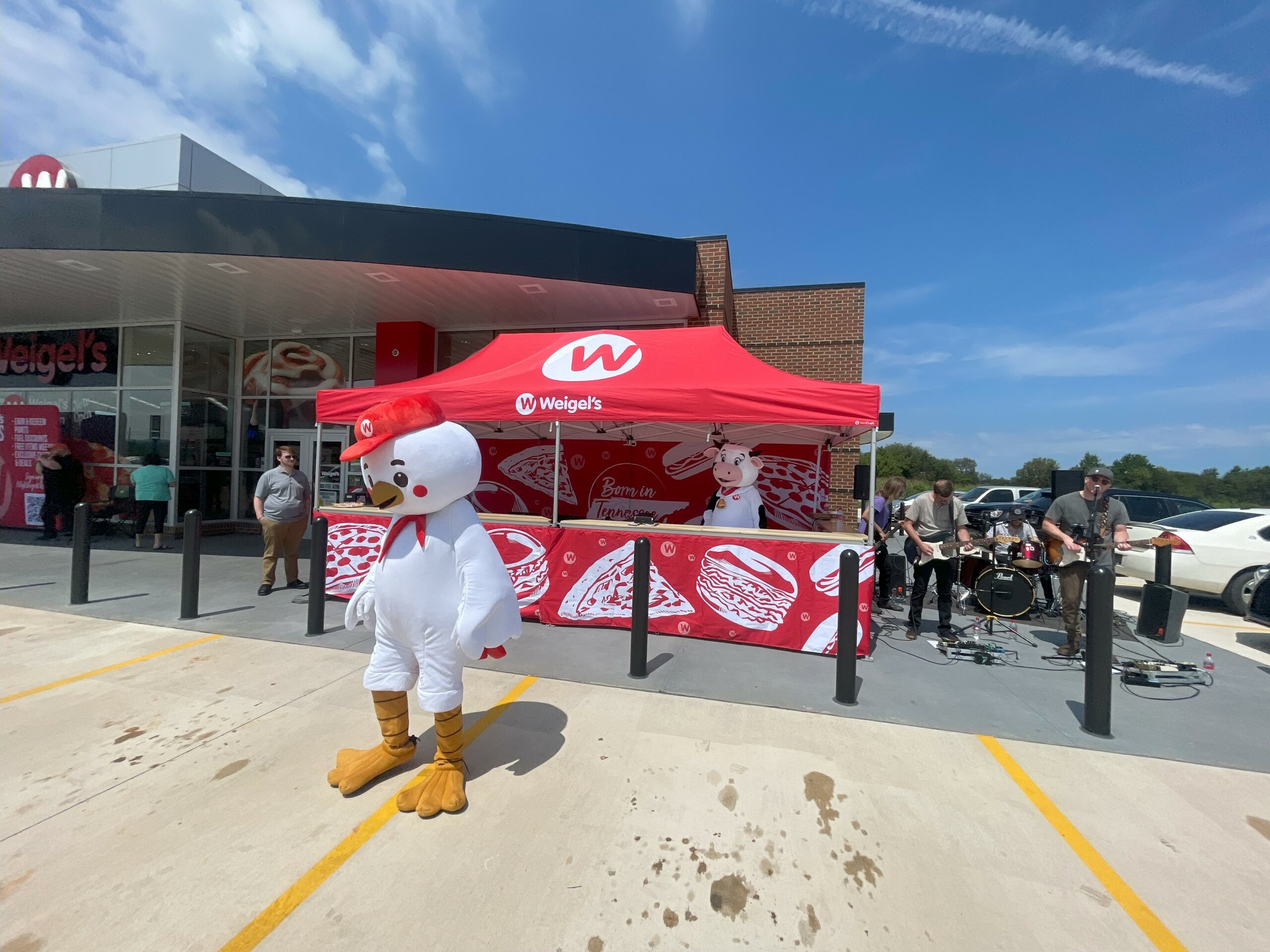 mascots at 80th store opening